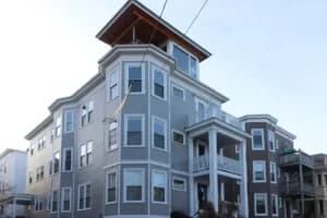 Asphalt shingle roof replacement, before and after, near the Eastern Prom