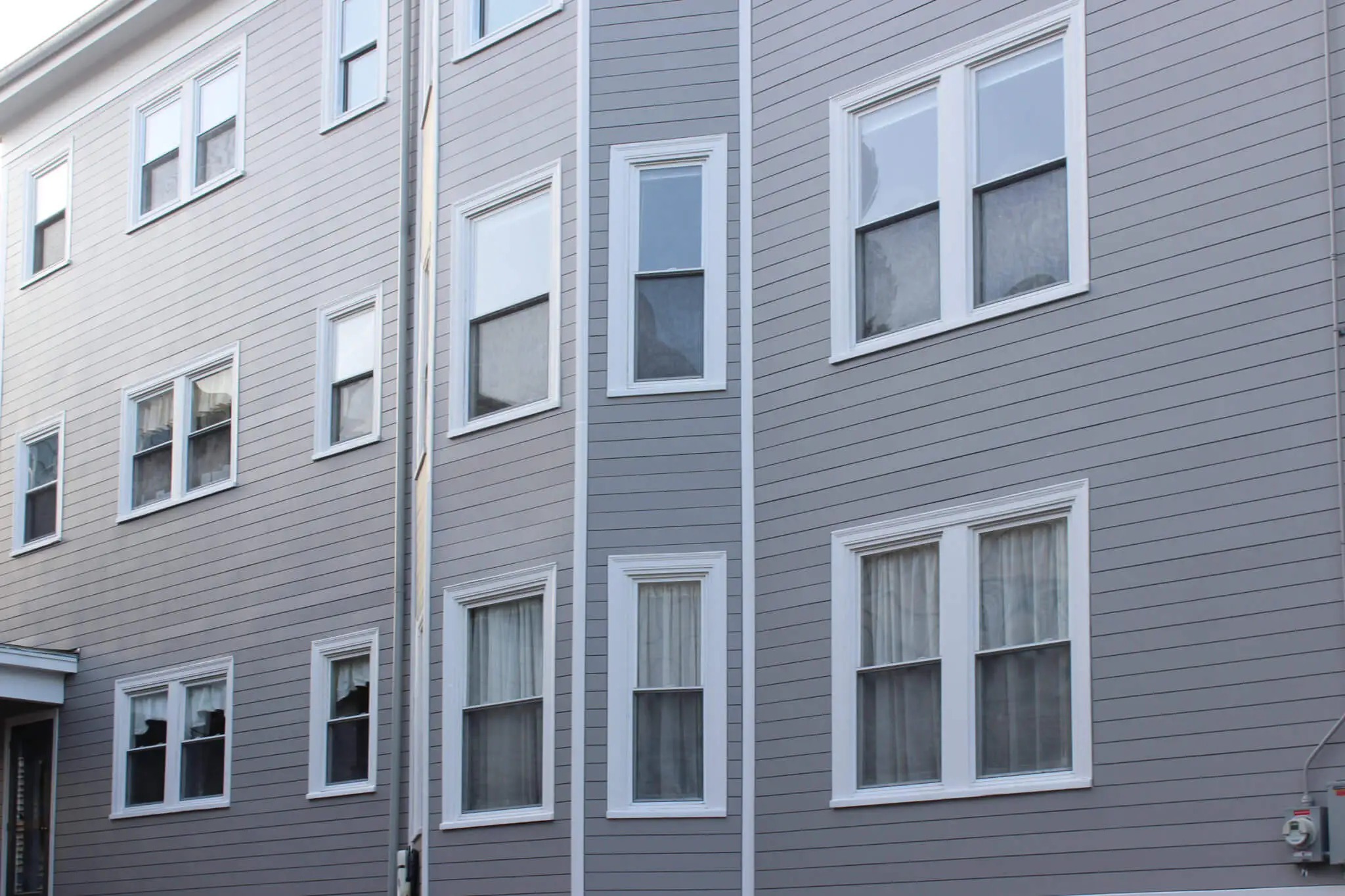 New vinyl replacement windows on a home near the Eastern Prom