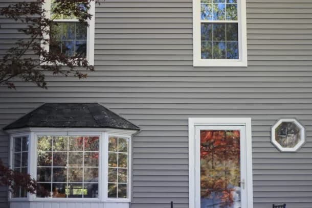 Cedar-style shingle siding on a North Deering farmhouse