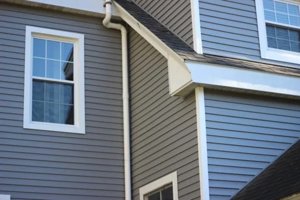 Cedar shingle siding corner millwork on a North Deering farmhouse