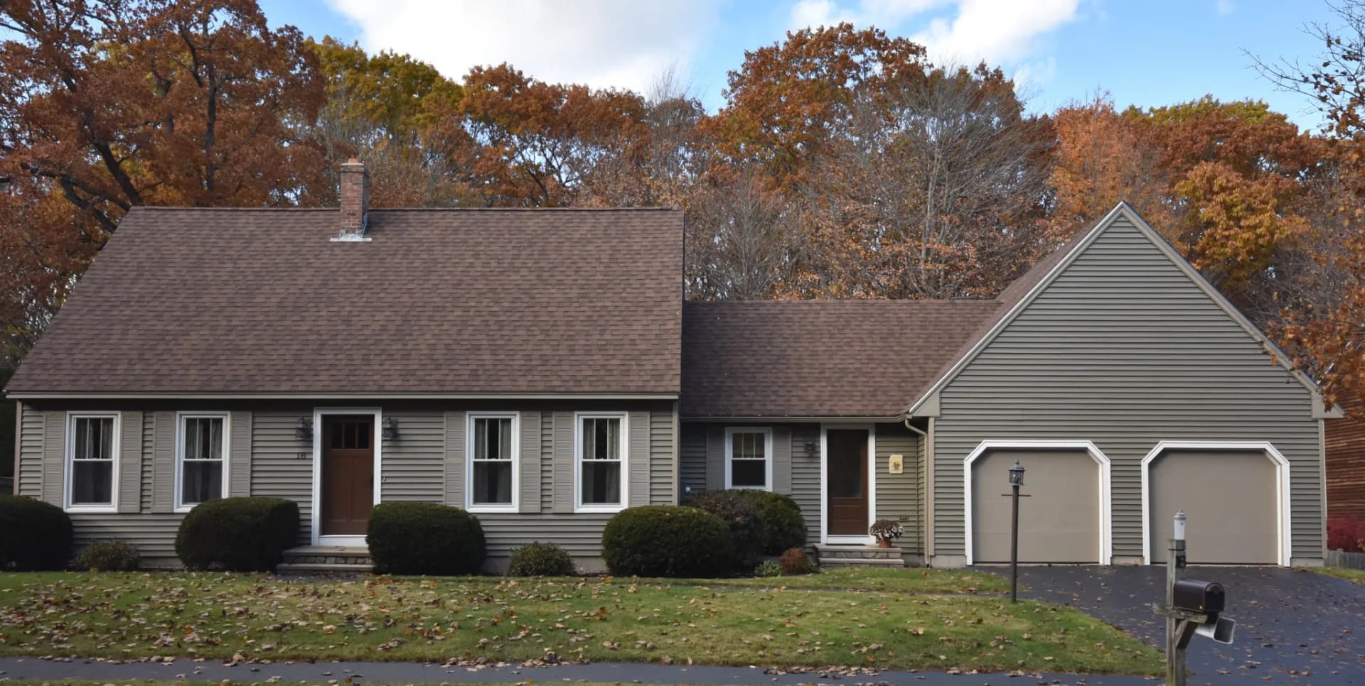 Vinyl siding and new shingles on a North Deering, Portland home by Cardinal Exteriors
