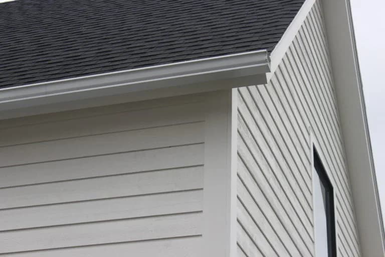 Fiber cement siding and trim detail on a new-construction Yarmouth home